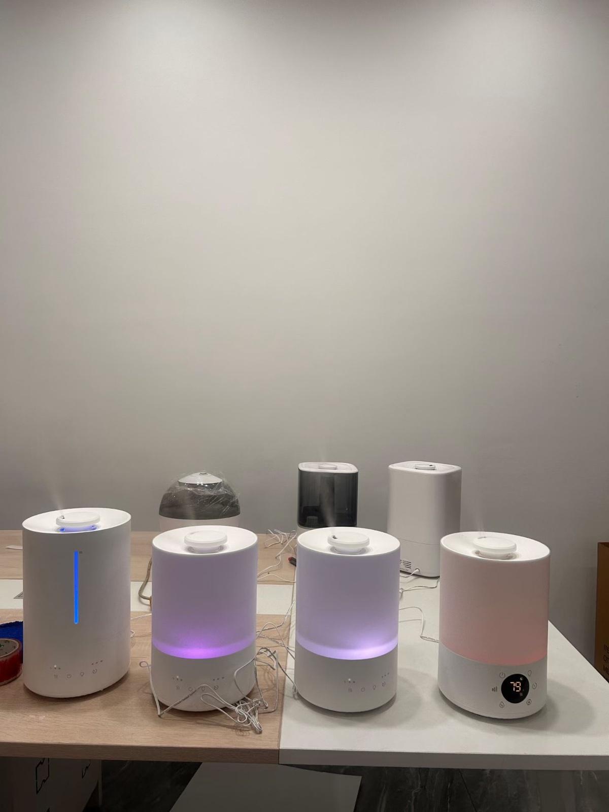 Multiple ultrasonic humidifier prototypes running during platform comparison